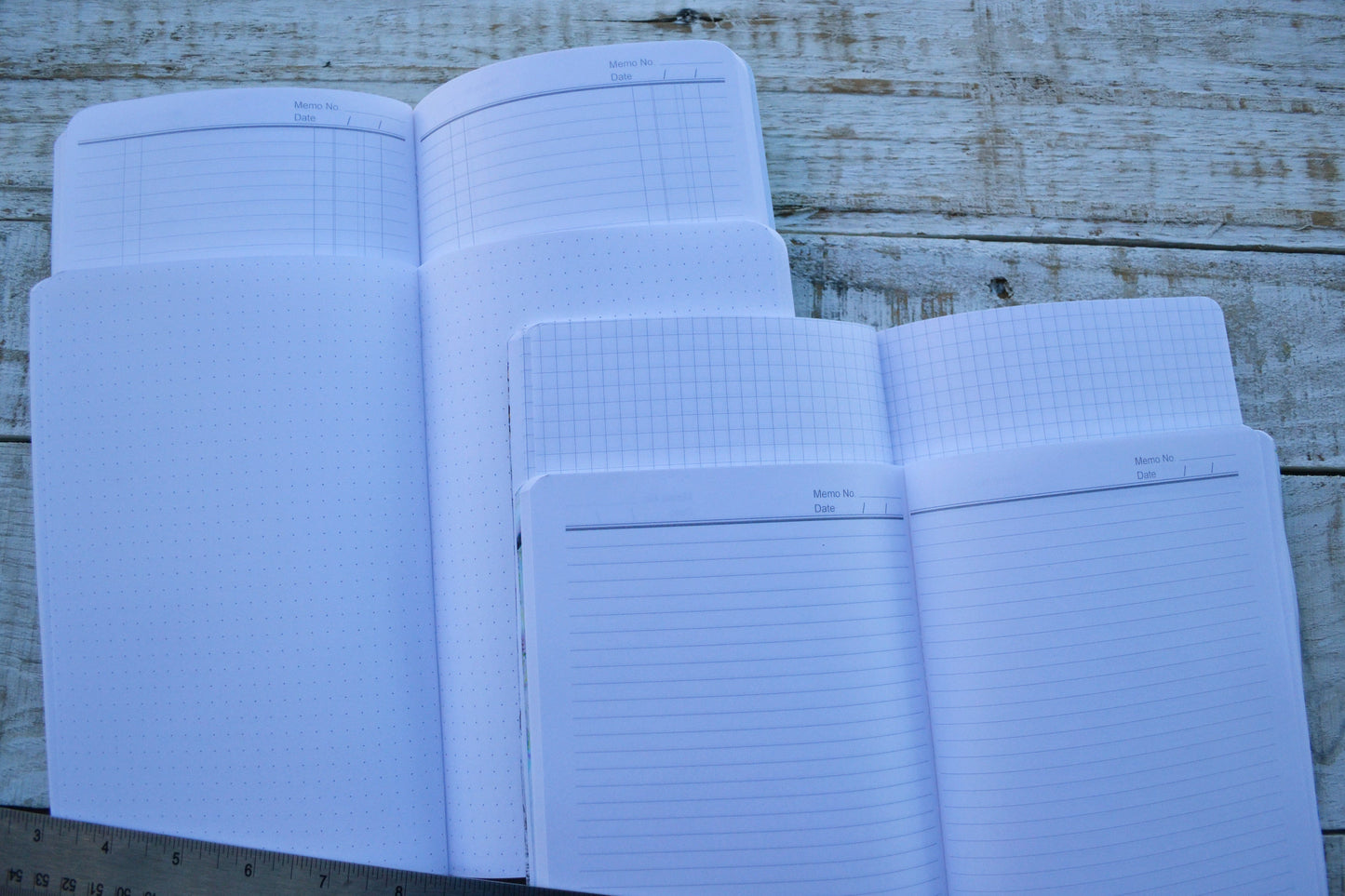 4 marbled notebooks inside and leather bound journal