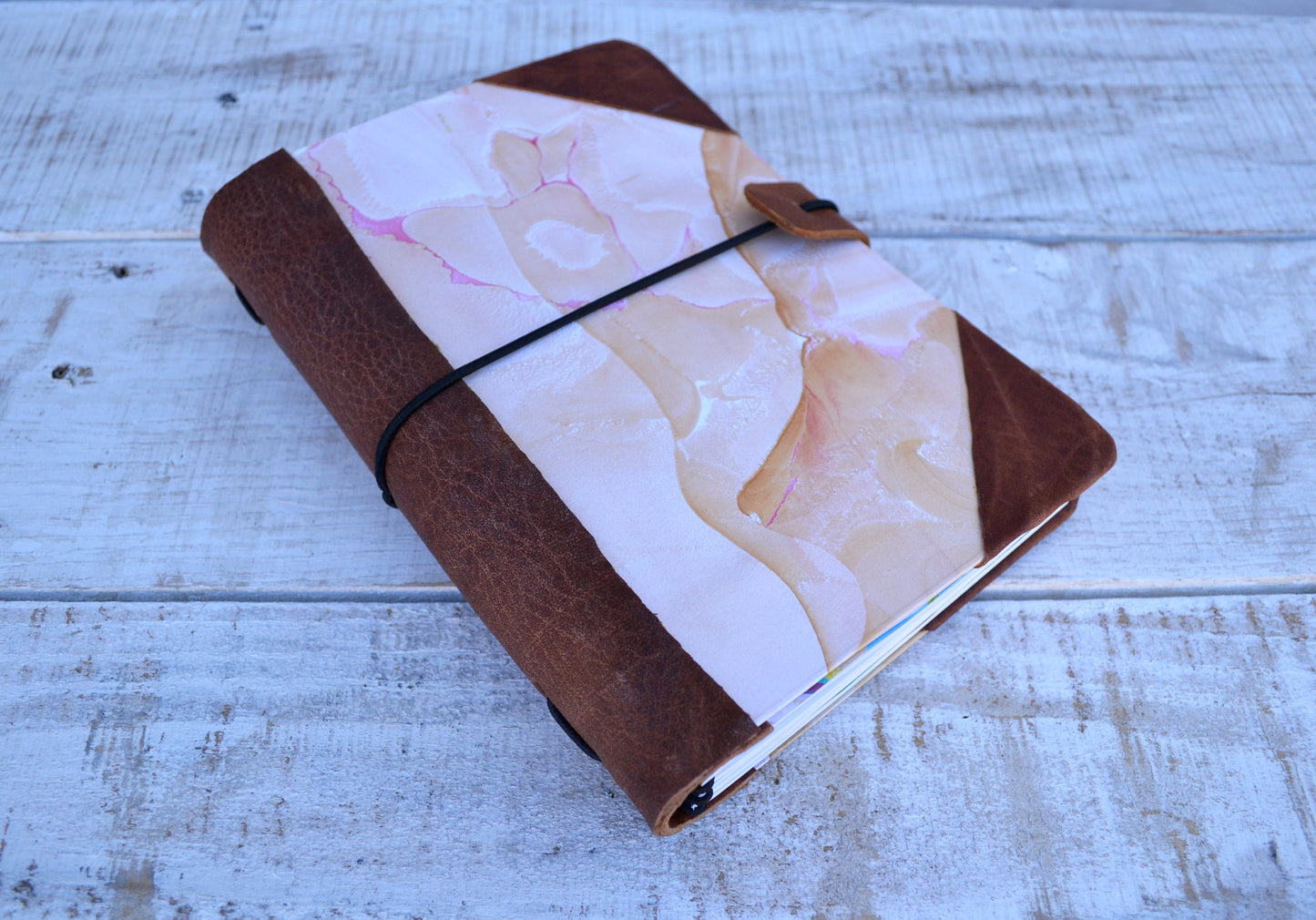 4 Hand-marbled notebooks with distressed leather bound