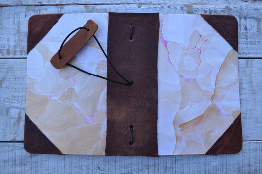 4 Hand-marbled notebooks with distressed leather bound